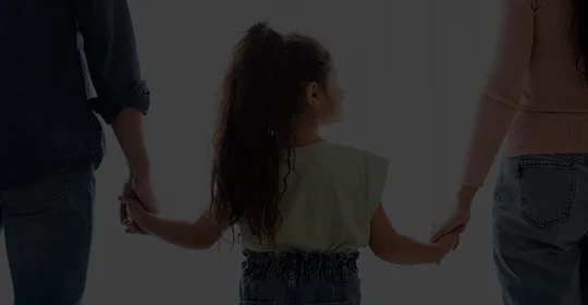 a girl holding hands with her arm extended