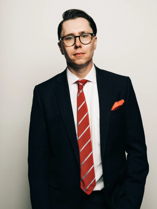 a man in a suit and tie