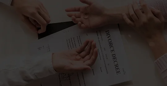 hands holding a wedding ring