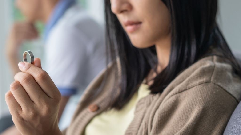 wife looking at wedding ring