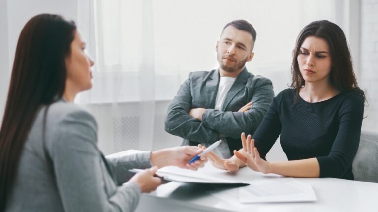 Couple is consulting with lawyer about collaborative divorce