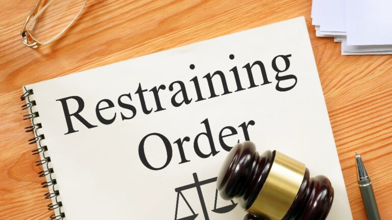 Restraining Order document and judge's gavel